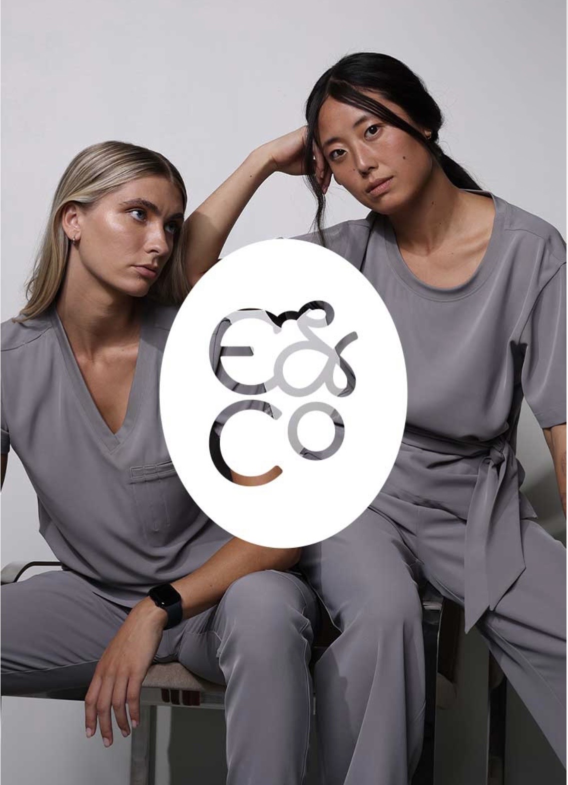 Cecilia and another model in a medical scrubs campaign image